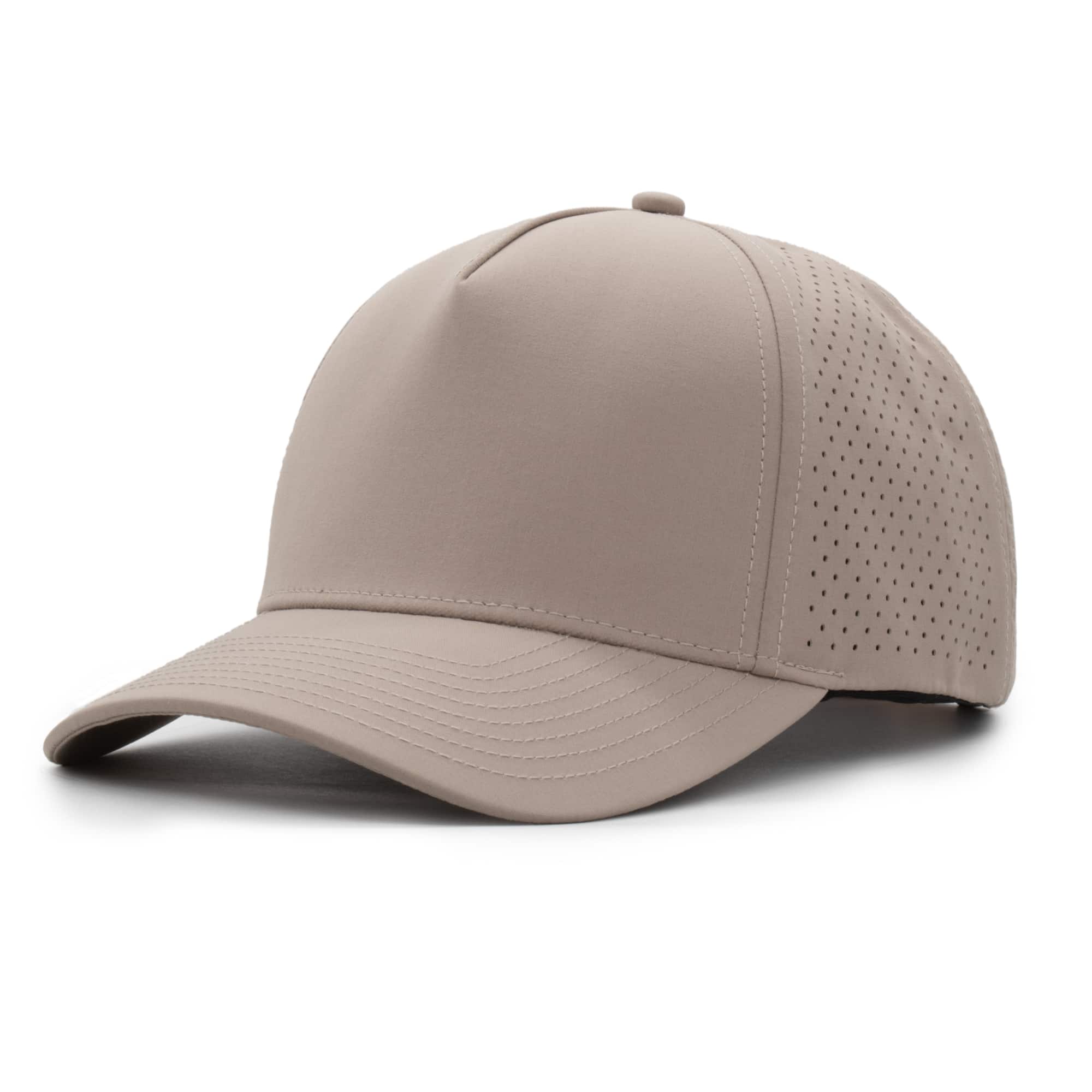 three-quarter view of a 5 panel, water resistant, floatable hat that is a warm tan color.